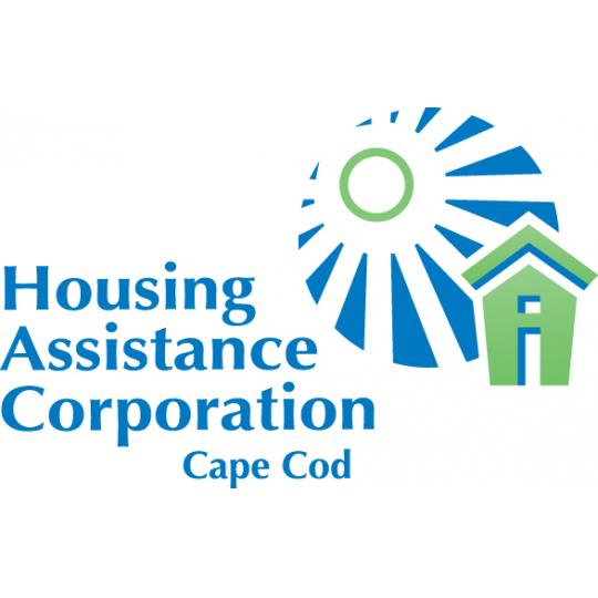 Logo for Housing Assistance Corporation Cape Cod, featuring a stylized sun and house in blue and green colors next to the organization's name in blue text.